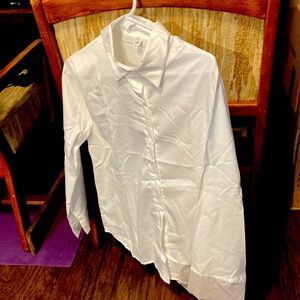 White flowing blouse goes anywhere with anything